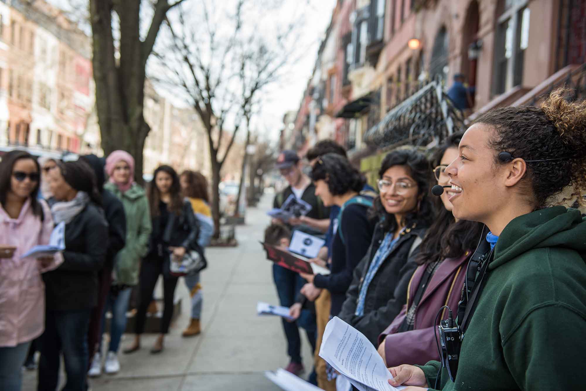 Asha Futterman leading the first walking tour on April 7, 2019 with over 35 people in attendance. Photo by Matt Harvey.